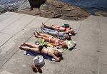 I didn't have a bikini - but it didn't stop me from joining these young ladies for a little sunbathing :)